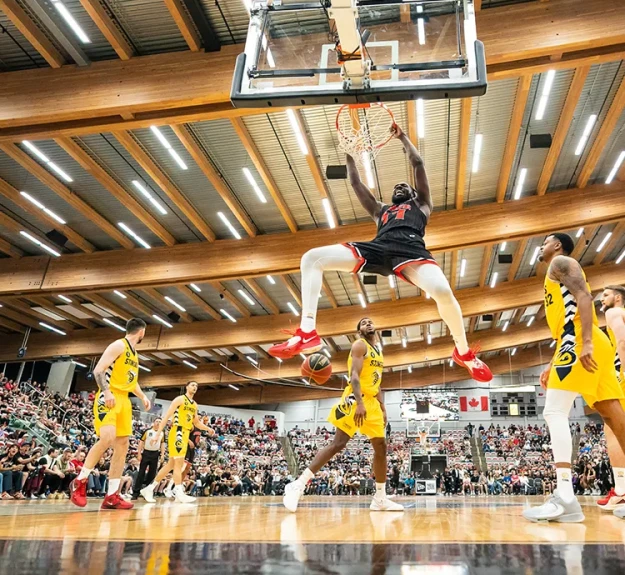Calgary Surge playing dunking during the inaugural game at WinSport Event Centre