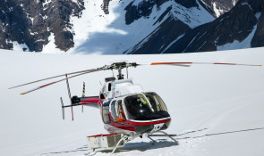 Helicopter landing at haig glacier 