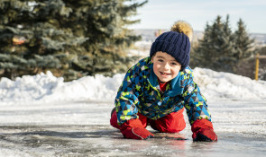 boy in snow suit at winsport 