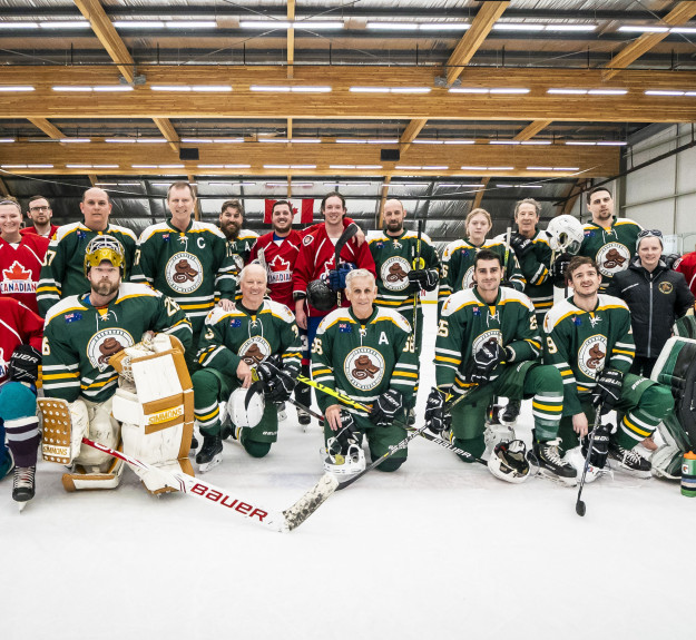 Winsport Adult hockey team photo on ice