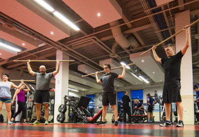 Adult members working out at performance training centre 