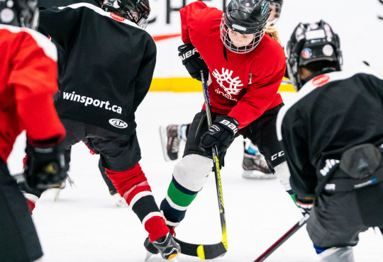 Winsport DevelopmentHockeyU13 faceofbetweentwoplayers