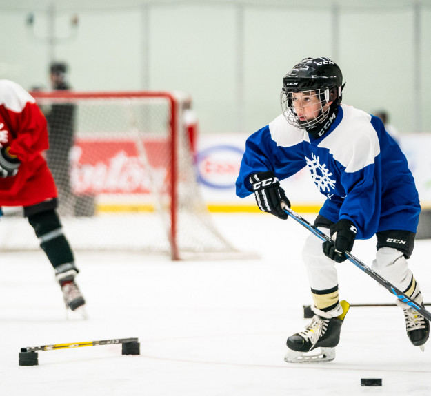 Winsport YouthHockey twochildrenplayhockey