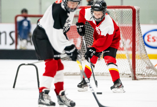 Winsport Youthhockey twoplayerswithpucks