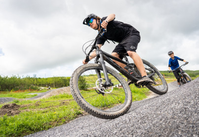 Instructor teaching mountain biking