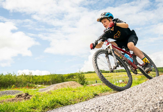 Winsport SummerCamps boyridingaroundacornerattheskillspark