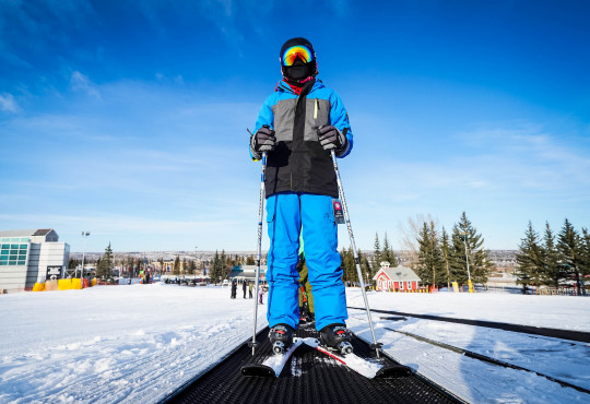 Winsport Ski youth skier on the hill
