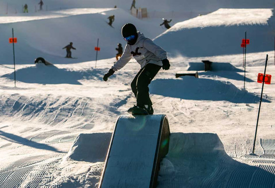 SBFundamentals young kid learning how to properly boardslide on a box