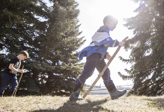 Winsport SummerCamps twoboyswalkingwithsticksoutdoors